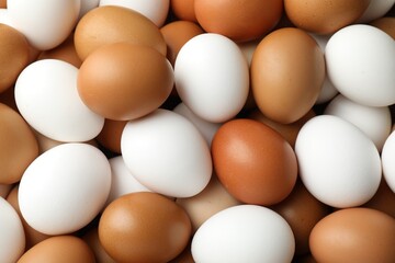 Many raw chicken eggs as background, closeup
