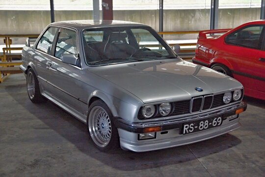 Silver BMW E30 3 series touring at car show