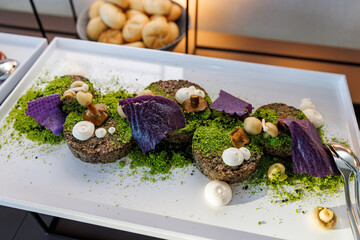 Savory mushroom bites with herb crumb and purple chips
