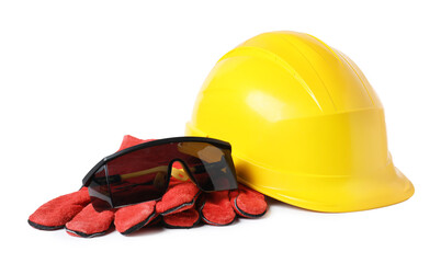 Safety equipment. Hard hat, protective gloves and goggles isolated on white