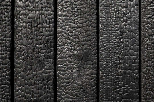 Burnt wooden boards . Sho Sugi Ban Yakisugi is a traditional Japanese method of wood preservation