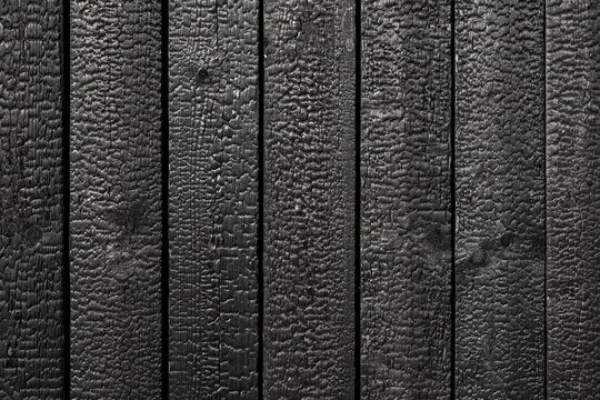 Burnt wooden boards . Sho Sugi Ban Yakisugi is a traditional Japanese method of wood preservation