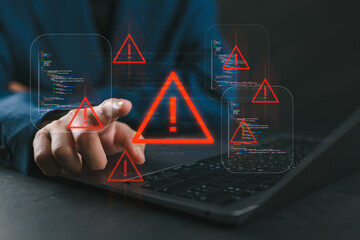 Ransomware malware attack and data breach. Businesswoman using laptop with spam virus on warning caution for notification on internet security protect.