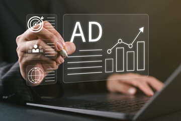 Digital marketing commerce online sale concept, Businesswoman use laptop with advertising on website. Planning advertising marketing strategies to target social media native, ad, advertisers, sales