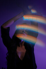 Moody Neon Portrait of Woman with Creative Lighting and Motion Blur