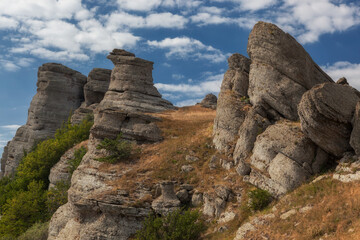 Fototapeta premium Alenga rocks on the summit of Southern Demerdji mountain, Crimea on summer morning