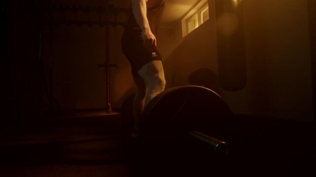 Engaging weight lifting workout at crossfit gym for strength training