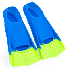 Pair of blue and neon green swim fins isolated on white background. Compact snorkeling flippers with soft silicone texture, designed for training, diving, and summer water sports adventures © mpodrucki