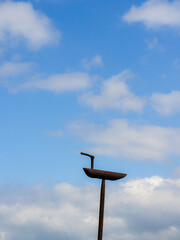 signpost on blue sky