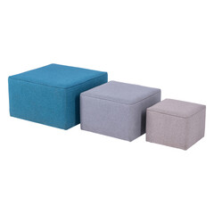 Set of three upholstered lounge footstools in blue, grey, and beige fabric. Minimalist square ottomans arranged in size order, showcasing modern home décor and soft textile texture