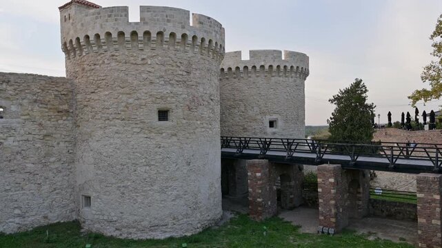 Evening View of the Zindan Gate at Belgrade Fortress with Panning Motion from Bridge to Entrance &ndash; Serbia