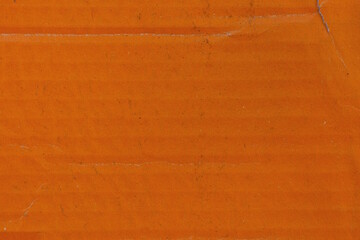 paper texture from a piece of dirty red cardboard on a box