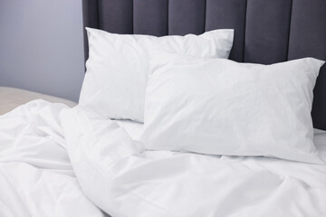 Bed with cozy fresh linens indoors, closeup