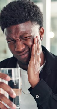 Toothache, water and business black man in office for cavity, orthodontics crisis and tmj pain. Gum sensitivity, gingivitis and oral health inflammation with person in agency for infection and drink