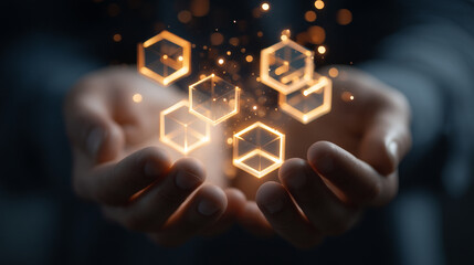 Illuminated hexagons floating above open hands against a dark blurred background with bokeh lights