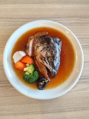 Salmon head simmered in Japanese soy sauce