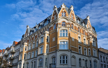 The facade of a historic Art Nouveau tenement house in Poznan