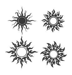 Set of four tribal sun vector icons. Black and white stylized sun symbols with flames for tattoo or logo.