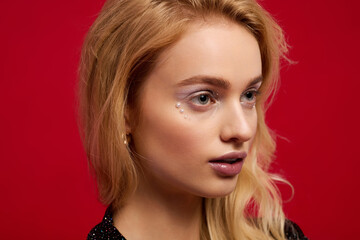 Holiday glamour featuring a young blonde woman