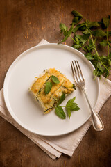 Zucchini flan with cheese and mint leaves