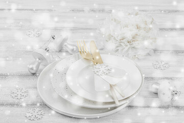 Christmas table setting. Festive New Year cutlery, traditional winter decor. Cozy mood, minimalist design