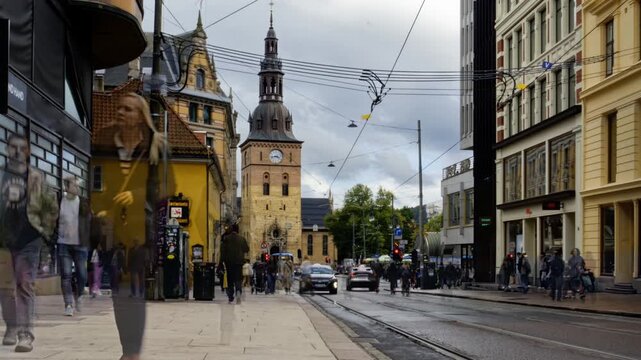 Busy city life. Pedestrians in old street in Oslo downtown,  Norway. Time Lapse. 