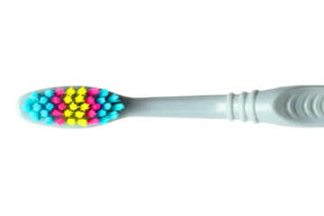 Close-up of a toothbrush head with colorful bristles for oral care on a transparent background