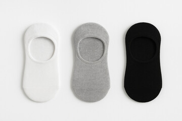 three no show socks mockup in neutral tones flat lay