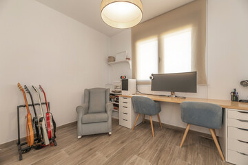 Teen bedroom with Nordic bed, study table with storage, and a cork board for notes