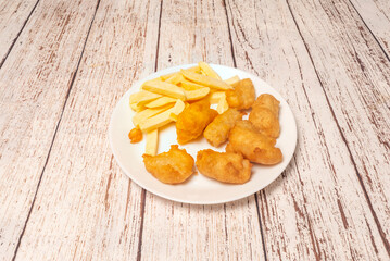 Homemade chicken nuggets made with ground chicken breast and breadcrumbs, fried to a delicious, even golden color