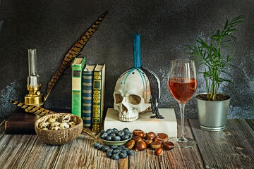 Gothic still life with an off-white skull contrasting with blood-red satin and a wrought-iron candelabra with drops of fossilized wax