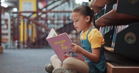 Reading, girl and child in library, knowledge and storytelling with book, development and language. Student, kid and growth with fantasy, education and hobby with literacy, smart and learning - Powered by Adobe