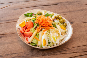 salad with canned tuna, chopped tomato, caramelized onion, and green pepper, dressed with a honey and mustard vinaigrette