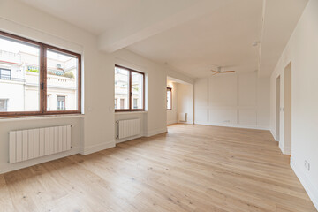 Main living room with bioclimatic design, north-south orientation for maximum light, and integrated sun protection