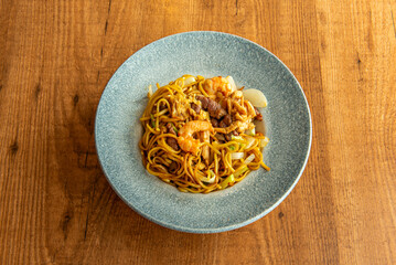 Spicy Sichuan noodles: noodles with duck meat, peanuts, and the signature Numbing Spice (má là) spice blend