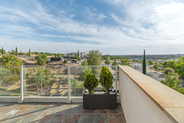 Terrace with state-of-the-art artificial grass, an outdoor fireplace, and comfortable sofas for evening gatherings