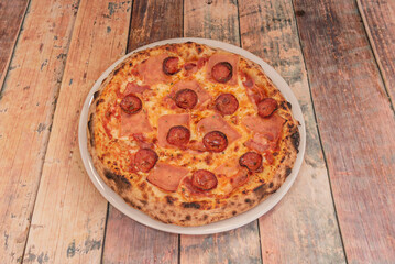 Chorizo ​​pizza with spicy Spanish chorizo, roasted peppers, red onion