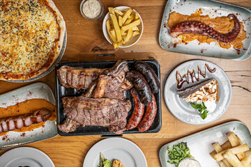 pork tenderloin stuffed with prunes and walnuts, wrapped in crispy bacon, with roasted sweet potato puree and green beans