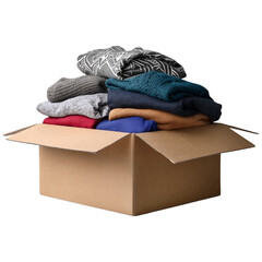 Cardboard box filled with neatly folded clothes ready for storage or moving day preparation