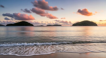 A serene coastal landscape with gentle waves, distant islands, and pastel clouds at sunset.