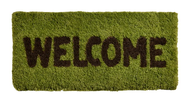 Green welcome doormat with textured surface