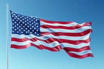 Fototapeta premium Waving flag symbolizes patriotism and national pride under clear blue sky