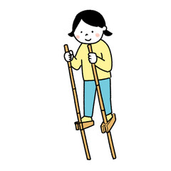 竹馬で遊ぶ女の子