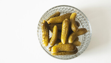 Bowl with tasty fermented cucumbers