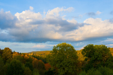 Autumn landscape with trees, castle and blue sky 2025 © Krzysiek Cegiełka