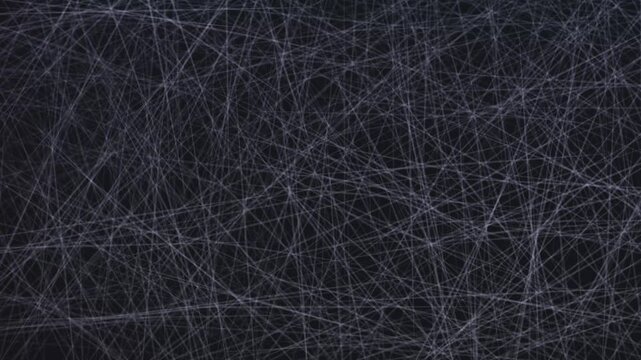 Looping abstract white scratches, lines on dark gray background. Digital animation. Chaotic pattern of thin, white or light gray lines. For technology, grunge, glitch, or abstract video projects 