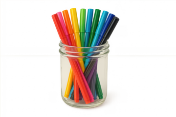 Colorful markers filling glass jar, rainbow spectrum art supplies