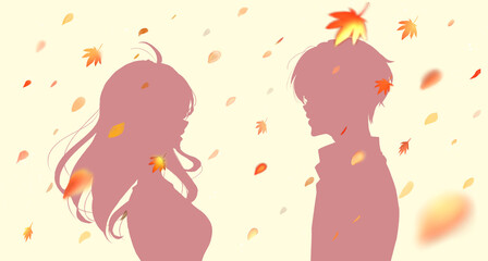 向かい合う男女カップル　紅葉　シルエット