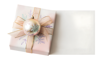 Elegant pastel gift box with a festive christmas ornament and ribbon, isolated on transparent background