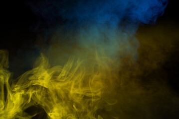 Yellow steam on a black background.